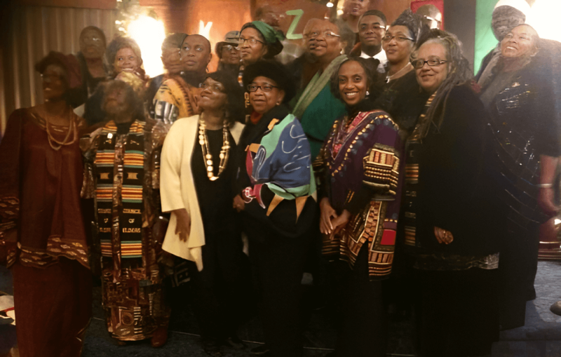 group-photo-elders-enstooling-upside-down-2012-e1738559787464-900x0_enhanced