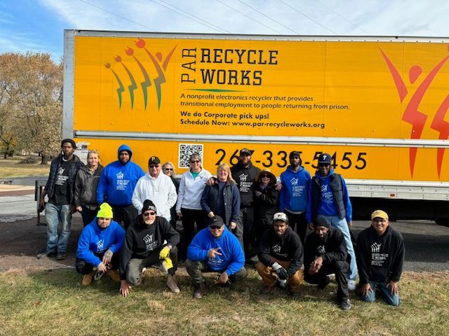 team-in-front-of-truck